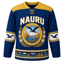 Load image into Gallery viewer, Nauru Original Hockey Jersey in Equator Blue, front view – NAURU chest lettering, pandanus-weave yoke and frigatebird medallion crest in ornate detailed artwork, custom name and number