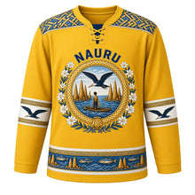 Load image into Gallery viewer, Nauru Original Hockey Jersey in Anibare Gold, front view – NAURU chest lettering, pandanus-weave yoke and frigatebird medallion crest in ornate detailed artwork, custom name and number