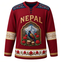 Load image into Gallery viewer, Nepal Original Hockey Jersey in Rhododendron Crimson, front view – NEPAL chest lettering, Dhaka-weave yoke and danphe-pheasant carved-window crest in ornate detailed artwork, custom name and number