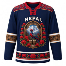 Load image into Gallery viewer, Nepal Original Hockey Jersey in Himalayan Navy, front view – NEPAL chest lettering, Dhaka-weave yoke and danphe-pheasant carved-window crest in ornate detailed artwork, custom name and number