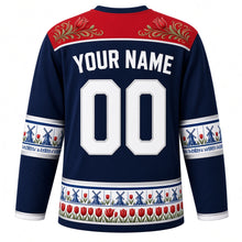Load image into Gallery viewer, Netherlands Original Hockey Jersey in North Sea Navy, back view with your name and number – Hindeloopen-painted yoke and Delft-tile sleeve bands