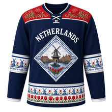 Load image into Gallery viewer, Netherlands Original Hockey Jersey in North Sea Navy, front view – NETHERLANDS chest lettering, Hindeloopen-painted yoke and Delft-tile windmill crest in ornate detailed artwork, custom name and number