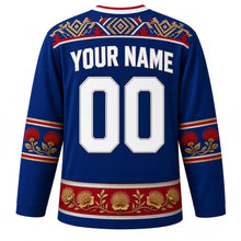 Load image into Gallery viewer, New Zealand Original Hockey Jersey in Tasman Blue, back view with your name and number – taniko-style woven yoke and pohutukawa sleeve bands