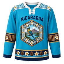 Load image into Gallery viewer, Nicaragua Original Hockey Jersey in Motmot Turquoise, front view – NICARAGUA chest lettering, Masaya hammock-weave yoke and guardabarranco volcano medallion crest in ornate detailed artwork, custom name and number