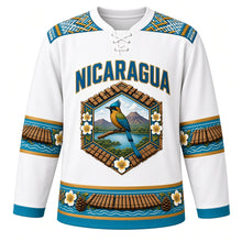 Load image into Gallery viewer, Nicaragua Original Hockey Jersey in Sacuanjoche White, front view – NICARAGUA chest lettering, Masaya hammock-weave yoke and guardabarranco volcano medallion crest in ornate detailed artwork, custom name and number