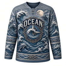 Load image into Gallery viewer, Ocean Wave Rider Original Hockey Jersey in Storm Slate, front view – towering curling waves, leaping dolphins and wave compass crest, custom name and number