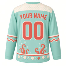 Load image into Gallery viewer, Octopus Tide Pool Original Hockey Jersey in Sea Glass Mint, back view with your name and number – bubble-dot yoke and tentacle-curl sleeve stripes