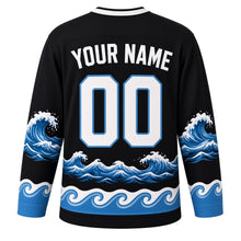 Load image into Gallery viewer, Orca Pod Waves Original Hockey Jersey in Deep Sea Black, back view with your name and number – bubble-pattern yoke and curling-wave sleeve stripes