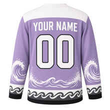 Load image into Gallery viewer, Orca Pod Waves Original Hockey Jersey in Arctic Lavender, back view with your name and number – bubble-pattern yoke and curling-wave sleeve stripes