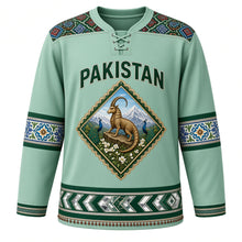 Load image into Gallery viewer, Pakistan Original Hockey Jersey in Indus Mint, front view – truck-art markhor diamond crest and Sindhi ajrak yoke with ornate detailed artwork, custom name and number