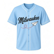 Load image into Gallery viewer, Paper Airplane Milwaukee Baseball Jersey in Breezy Sky Blue, front view – folded paper airplane with dashed loop flight trail graphic with cloud crest, custom name and number