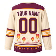 Load image into Gallery viewer, Paper Lantern Night Original Hockey Jersey in Rice Paper Cream, back view with your name and number – cloud-swirl yoke and lantern-dot sleeve bands