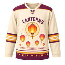 Load image into Gallery viewer, Paper Lantern Night Original Hockey Jersey in Rice Paper Cream, front view – glowing paper lanterns floating over a calm river with lantern crest, custom name and number