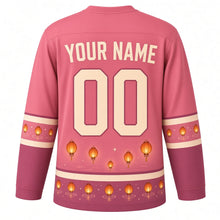 Load image into Gallery viewer, Paper Lantern Night Original Hockey Jersey in Dusk Rose, back view with your name and number – cloud-swirl yoke and lantern-dot sleeve bands