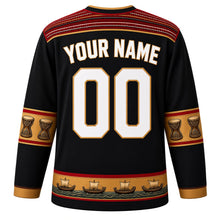 Load image into Gallery viewer, Papua New Guinea Original Hockey Jersey in Volcanic Black, back view with your name and number – bilum-weave yoke and kundu-drum sleeve bands