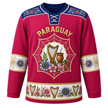 Load image into Gallery viewer, Paraguay Original Hockey Jersey in Lapacho Rose, front view – ñandutí lace harp crest and ao po'i embroidery yoke with ornate detailed artwork, custom name and number