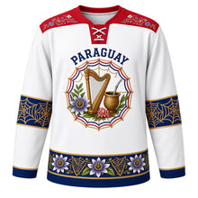 Load image into Gallery viewer, Paraguay Original Hockey Jersey in Nanduti White, front view – ñandutí lace harp crest and ao po'i embroidery yoke with ornate detailed artwork, custom name and number