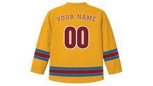 Load image into Gallery viewer, Phnom Penh Original Hockey Jersey in Saffron Yellow, back view with your name and number