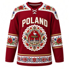 Load image into Gallery viewer, Poland Original Hockey Jersey in Krakow Crimson, front view – Zalipie flower yoke and wycinanki paper-cut stork crest with ornate detailed artwork, custom name and number