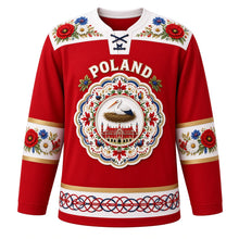 Load image into Gallery viewer, Poland Original Hockey Jersey in Lowicz Red, front view – Zalipie flower yoke and wycinanki paper-cut stork crest with ornate detailed artwork, custom name and number