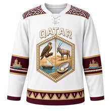 Load image into Gallery viewer, Qatar Original Hockey Jersey in Pearl White, front view – Al Sadu weave yoke and pearl-studded falcon and oryx crest with ornate detailed artwork, custom name and number