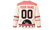 Load image into Gallery viewer, Retro Vinyl Groove Original Hockey Jersey in Retro Cream, back view with your name and number – music-note yoke and sound-wave sleeve bands
