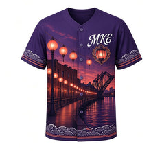 Load image into Gallery viewer, Riverwalk Lanterns Milwaukee Baseball Jersey in Dusk Indigo, front view – glowing lanterns, bridges and river reflections at dusk, custom name and number
