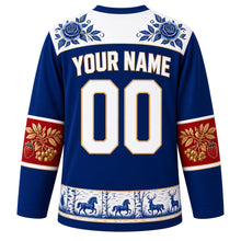 Load image into Gallery viewer, Russia Original Hockey Jersey in Gzhel Cobalt, back view with your name and number – Gzhel-painted yoke and Khokhloma berry sleeve bands