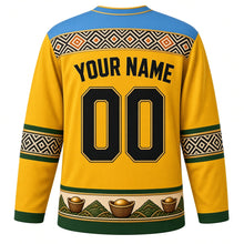 Load image into Gallery viewer, Rwanda Original Hockey Jersey in Sunrise Yellow, back view with your name and number – imigongo relief yoke and agaseke basket-weave sleeve bands