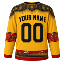 Load image into Gallery viewer, Saint Kitts and Nevis Original Hockey Jersey in Sunshine Gold, back view with your name and number – masquerade-pattern yoke and flamboyant blossom sleeve bands