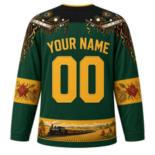 Load image into Gallery viewer, Saint Kitts and Nevis Original Hockey Jersey in Cane Field Green, back view with your name and number – masquerade-pattern yoke and flamboyant blossom sleeve bands