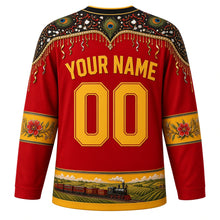 Load image into Gallery viewer, Saint Kitts and Nevis Original Hockey Jersey in Flamboyant Red, back view with your name and number – masquerade-pattern yoke and flamboyant blossom sleeve bands