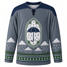Load image into Gallery viewer, Saint Swithin's Day Original Hockey Jersey in Rain Slate, front view with themed artwork and clean crest