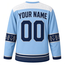 Load image into Gallery viewer, San Marino Original Hockey Jersey in Titano Sky Blue, back view with your name and number – battlement-stone yoke and crossbow-bolt sleeve bands