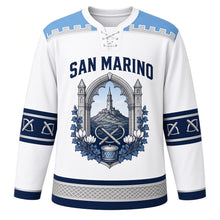 Load image into Gallery viewer, San Marino Original Hockey Jersey in Guaita White, front view – battlement-stone yoke and gothic-arch Mount Titano tower crest with ornate detailed artwork, custom name and number