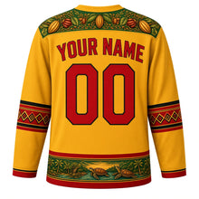Load image into Gallery viewer, Sao Tome and Principe Original Hockey Jersey in Cocoa Gold, back view with your name and number – cocoa-pod leaf yoke and drum-diamond sleeve bands