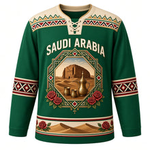 Load image into Gallery viewer, Saudi Arabia Original Hockey Jersey in Oasis Emerald, front view – Al-Qatt geometric yoke and octagonal AlUla Elephant Rock crest with ornate detailed artwork, custom name and number