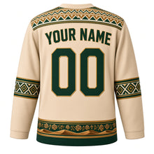 Load image into Gallery viewer, Saudi Arabia Original Hockey Jersey in Dune Sand, back view with your name and number – Al-Qatt geometric yoke and Al Sadu woven sleeve bands