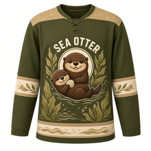 Load image into Gallery viewer, Sea Otter Kelp Forest Original Hockey Jersey in Kelp Olive, front view – sea otter floating among kelp with a seashell and sea-otter crest, custom name and number