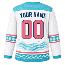 Load image into Gallery viewer, Sea Turtle Voyage Original Hockey Jersey in Seashell White, back view with your name and number – wave-scallop yoke and shell-pattern sleeve stripes
