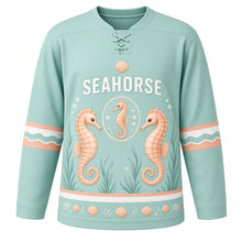 Load image into Gallery viewer, Seahorse Reef Original Hockey Jersey in Seafoam Mint, front view – two curly-tailed seahorses among sea grass with seahorse crest, custom name and number