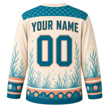 Load image into Gallery viewer, Seahorse Reef Original Hockey Jersey in Pearl Sand, back view with your name and number – scallop shell yoke and wave-curl sleeve bands