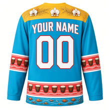 Load image into Gallery viewer, Seychelles Original Hockey Jersey in Lagoon Blue, back view with your name and number – coco de mer frond and orchid yoke with moutya-drum sleeve bands