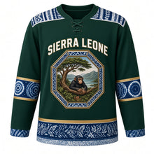 Load image into Gallery viewer, Sierra Leone Original Hockey Jersey in Rainforest Green, front view – Cotton Tree and Lion Mountains octagon crest under SIERRA LEONE lettering, ornate country-cloth yoke and detailed artwork, custom name and number