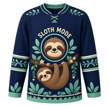 Load image into Gallery viewer, Sleepy Sloth Hammock Original Hockey Jersey in Twilight Indigo, front view – smiling sloth hanging from a jungle branch with leaves and sloth crest, custom name and number