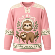 Load image into Gallery viewer, Sleepy Sloth Hammock Original Hockey Jersey in Sunset Pink, front view – smiling sloth hanging from a jungle branch with leaves and sloth crest, custom name and number