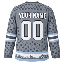 Load image into Gallery viewer, Snow Leopard Peaks Original Hockey Jersey in Glacier Gray, back view with your name and number – rosette-spot yoke and mountain-silhouette hem stripes