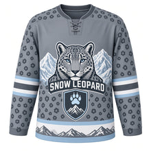 Load image into Gallery viewer, Snow Leopard Peaks Original Hockey Jersey in Glacier Gray, front view – snow leopard head, rosette spots and paw-and-peak shield crest, custom name and number