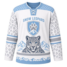 Load image into Gallery viewer, Snow Leopard Peaks Original Hockey Jersey in Snowfield White, front view – snow leopard head, rosette spots and paw-and-peak shield crest, custom name and number
