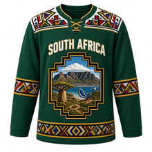 Load image into Gallery viewer, South Africa Original Hockey Jersey in Bushveld Green, front view – Ndebele-pattern yoke and stepped-gable crest with Table Mountain, baobab and blue crane, ornate detailed artwork, custom name and number